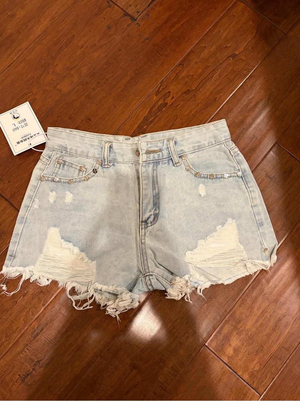 Light Blue Distressed Denim Women's Shorts